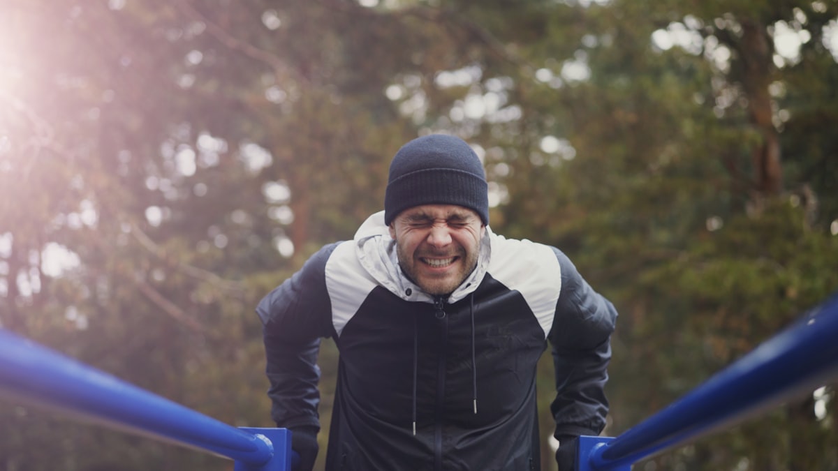 Upper body strength training demonstration for mature men